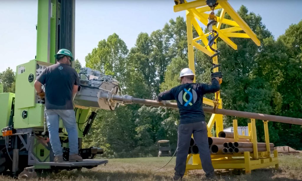 TUG pipe handling for sonic drill rig in action