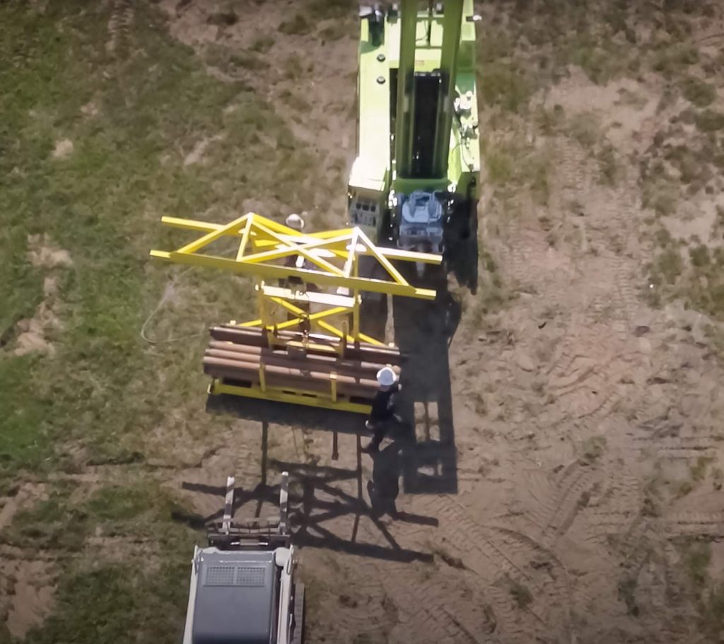 arial view of TUG pipe handling for sonic drill rig 